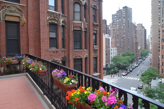 A balcony with flowers photo