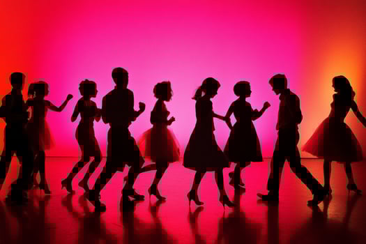Silhouette of people dancing in a disco photo