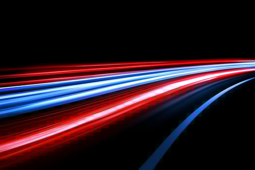 Light trails on a highway at night photo