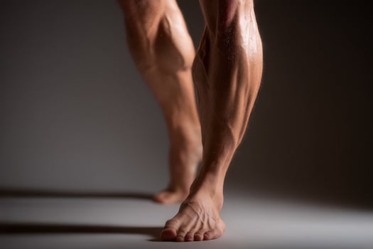 A man's legs are shown in a studio photo