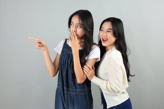 Two Young Asian Friends Happy Surprised Face, photo