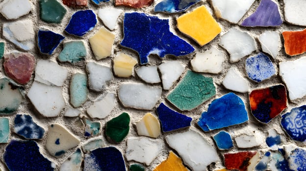 Colorful broken tiles forming a unique mosaic pattern, offering an abstract and vibrant artistic texture photo