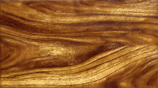 Detailed texture of rich acacia wood with flowing grain patterns creates a natural warm aesthetic photo