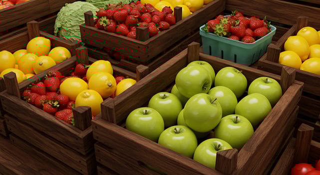 A wooden crate with apples and strawberries photo