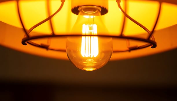 light bulb hanging from a ceiling fixture photo