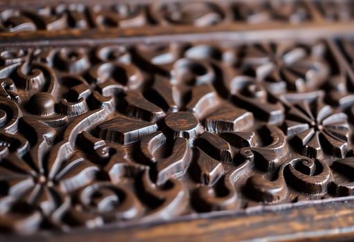 Close up of carved wood on a table photo