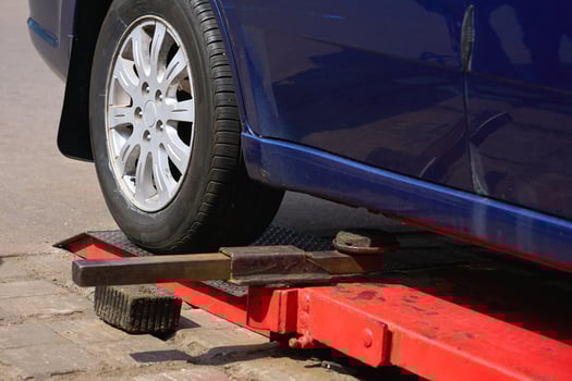 Automobile car on lift for changing wheel,auto repair photo