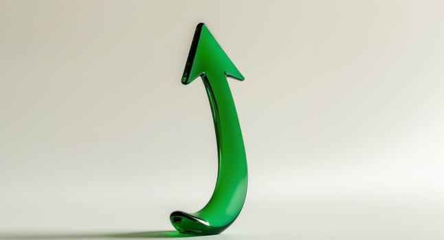 Green Glass Arrow Pointing Upward, Symbolizing Growth, Progress, and Direction. photo