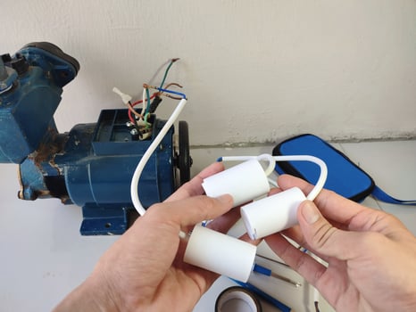 repairing electric motor capacitors or single phase motors photo
