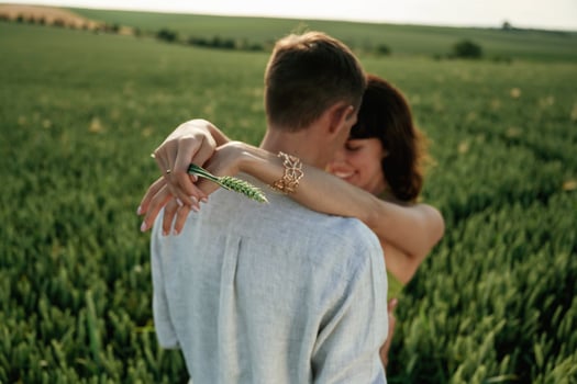 Closeness, of ,the, people, embracing. Lovely couple are on the agricultural field together photo
