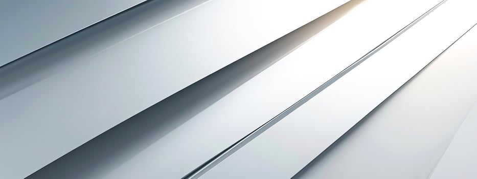 Abstract metallic background featuring sleek, angled silver panels reflecting light, creating a modern and dynamic visual effect with a sense of depth and movement photo