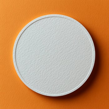 White Paper Circle on Orange Background Minimal Design photo