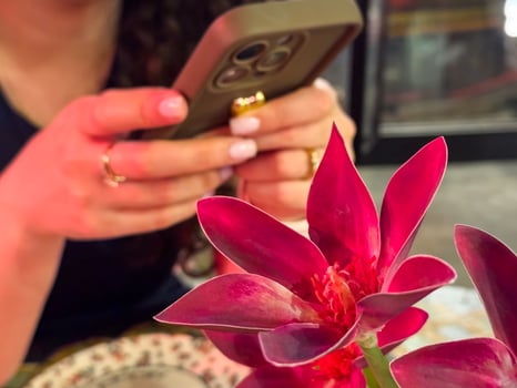Red on the background of a girl scrolling through social networks photo