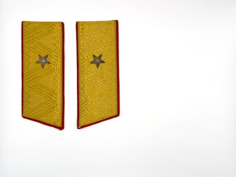 Military shoulder straps of the USSR, shoulder straps on the shoulders of the military, golden shoulder straps on a white background photo