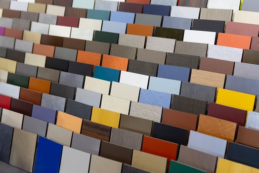 Multi-colored samples of composite materials for the ventilated facades in showroom. Industry photo