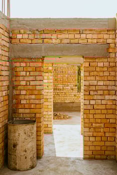 A door with a brick wall in the background photo