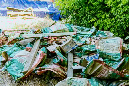A pile of bags on the ground photo