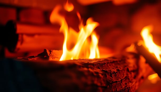 close up of a fire burning in a fireplace photo
