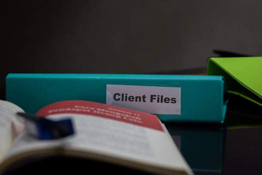 folders with the label Client files, Business management concept photo