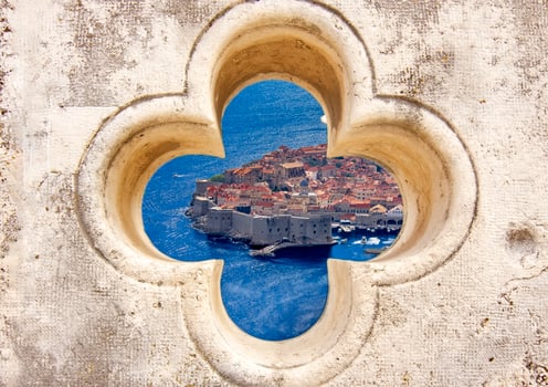 Famous old town Dubrovnik through stone window view photo