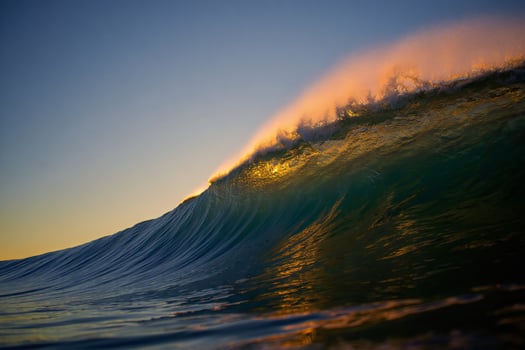 Nature Background Majestic Ocean Wave at Sunset Golden Light Powerful Surf Dramatic Seascape photo