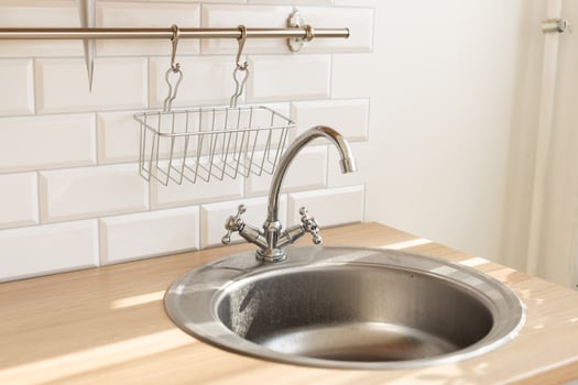 Kitchen silver sink modern decoration house stainless steel close-up at home photo