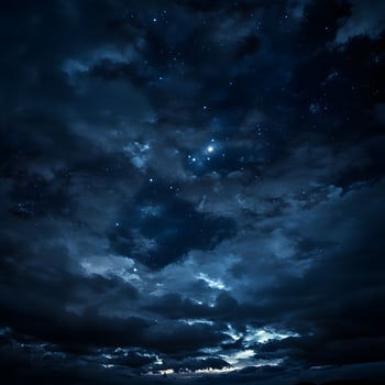 Dark clouds covering the starry night sky photo