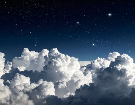 Stars shining above beautiful white clouds at night photo