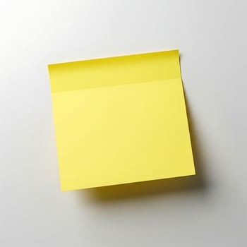 Blank Yellow Sticky Note - Isolated Post-It Reminder on White Background for Office, Memo, and Productivity Concepts photo