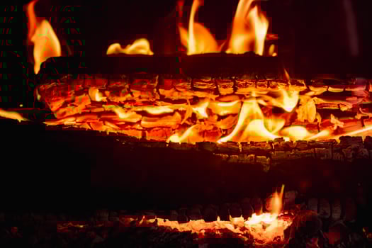 Fire in a fireplace in the living room, burning photo