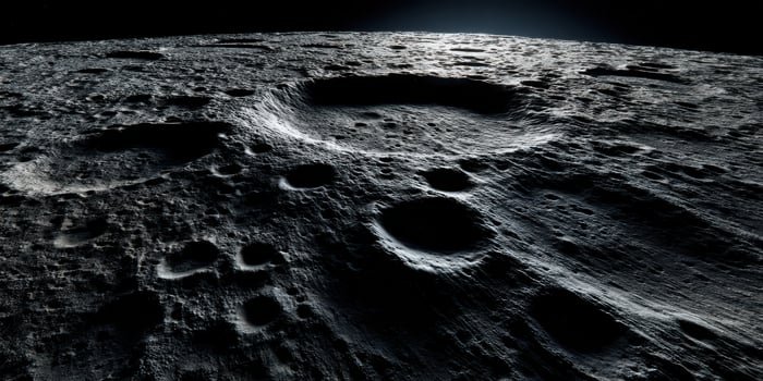 Detailed view of the moon surface with craters and shadows photo