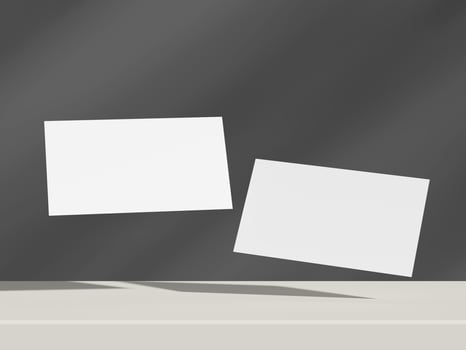 Dark grey floating business card mockup pair with soft diffused shadows photo