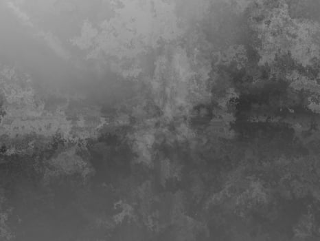 Smooth gray metal background with misty, faded, and fragmented designs. photo