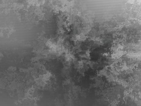Distressed gray metal surface with blurry textures and soft contrasts. photo