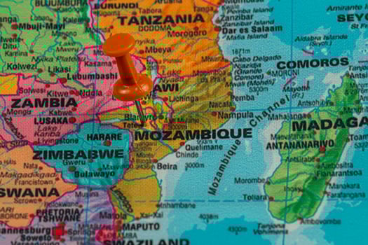 Pin marking location in Mozambique on a colorful map photo