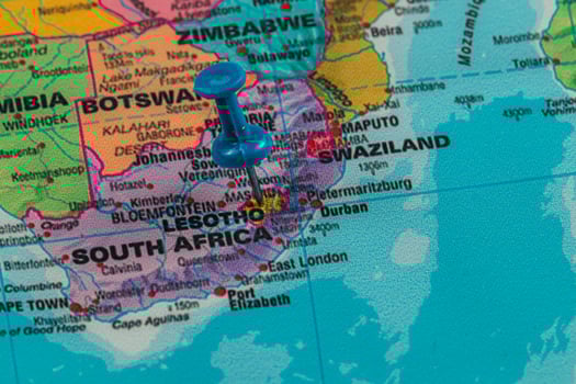 Marker shows Lesotho on a map of southern Africa photo