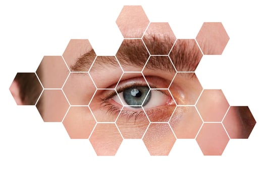 Eye close-up with hexagonal pattern overlay illustrating vision and perception in digital art photo