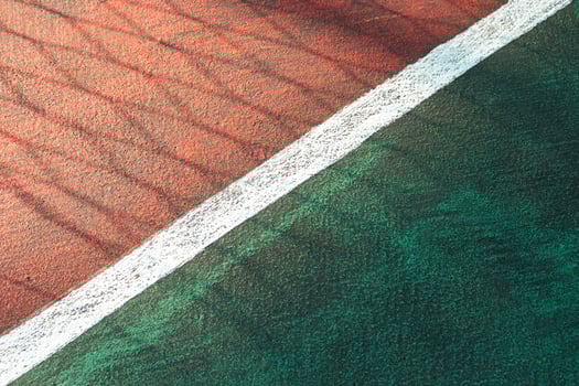 Sport concept. Basketball court in public park with the shade of fences. After edits. photo