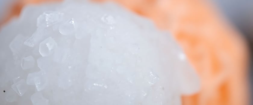 close up of a white substance on an orange object photo