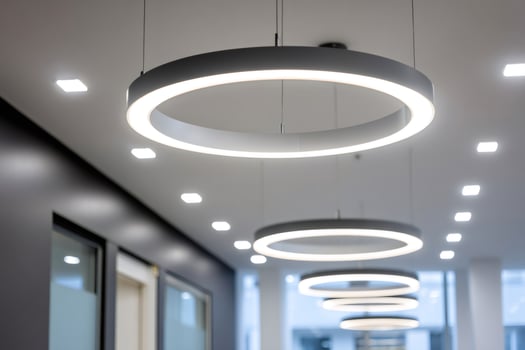 Modern circular led ceiling lights illuminating corridor photo