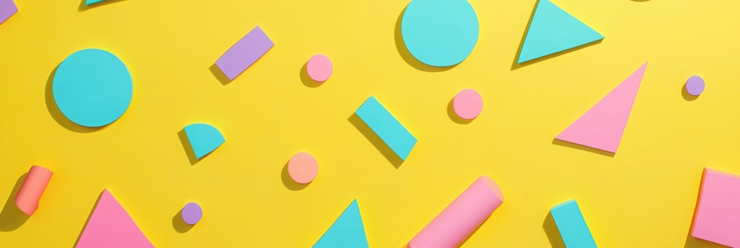 Colorful geometric shapes pattern on vibrant yellow background with circles, triangles, rectangles, and squares in pink, blue, and purple photo