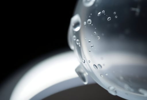 close up of a water pitcher with water droplets photo