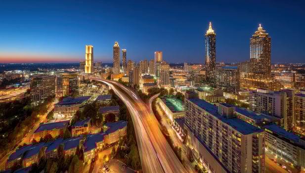Atlanta Georgia at night aerial view shows highway and buildings lights photo