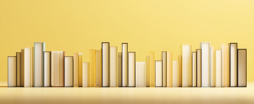 The colorful arrangement of books against a vibrant yellow background photo