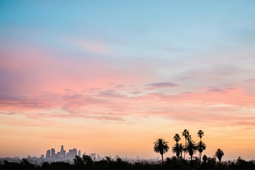 The Beauty of Sunset Over City with Trees Landscape View Scenery photo