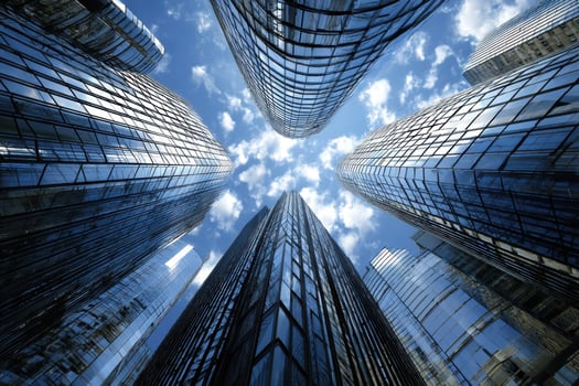Modern Skyscrapers Rising Against a Blue Sky Symbolizing Progress and Innovation Vision photo