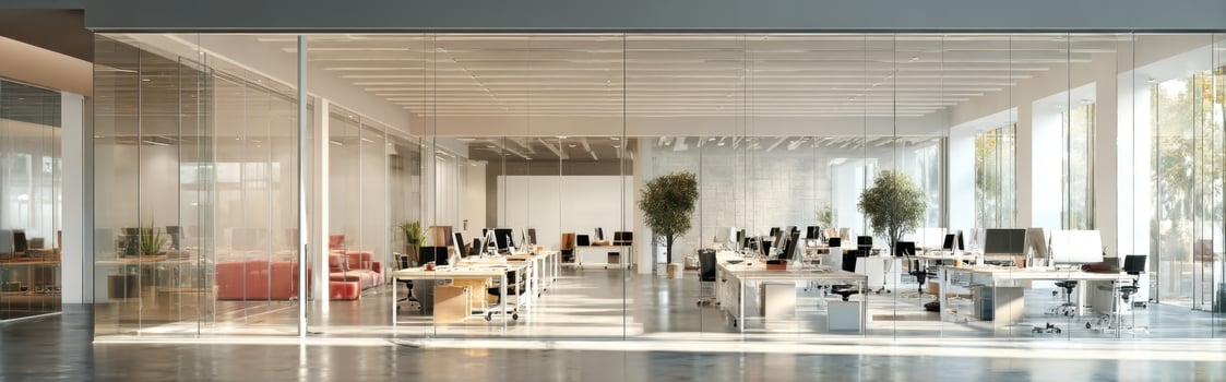Modern and Bright Open Office Space with Glass Walls and Minimalist Decor photo