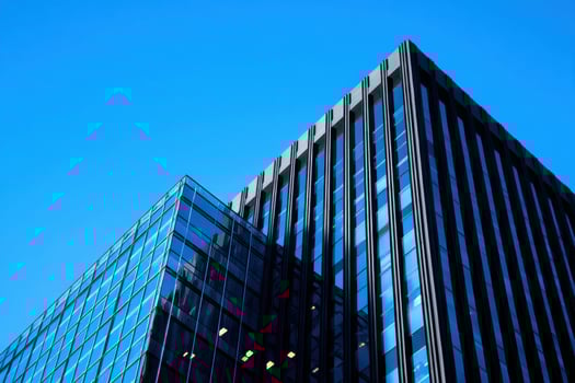 Modern office building with blue sky background photo