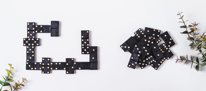 Traditional black dotted dominoes for table game top view web banner photo