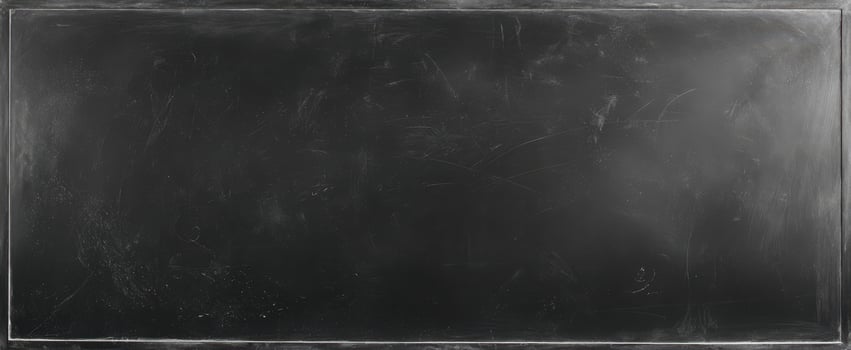 The empty chalkboard ready for notes and creative ideas. photo
